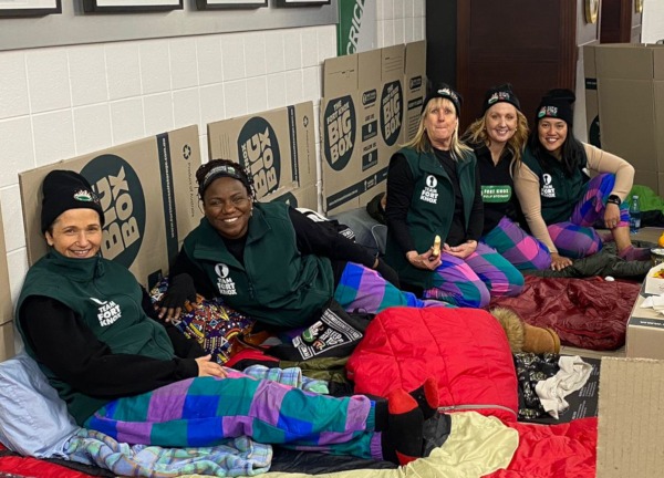 Fort Knox team members in their sleeping bags spending a cold night at the MCG for charity